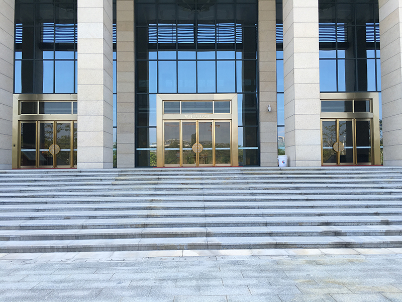 钛金不锈钢电动地弹簧门