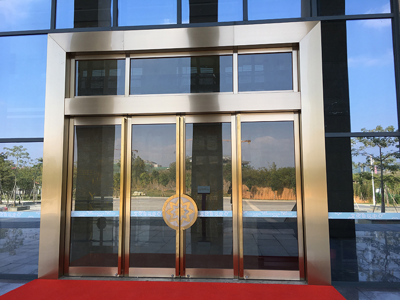 钛金不锈钢边框电动地弹簧门